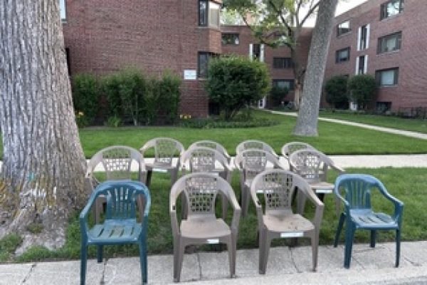 A dozen chairs lined up on Central Street at 5:45 a.m. July 1.