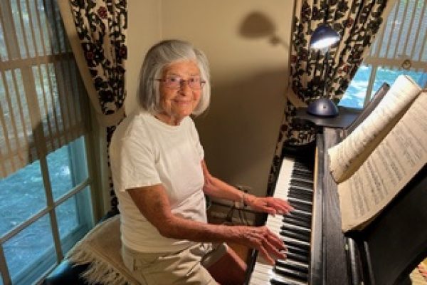 Gloria Boyell at her piano.